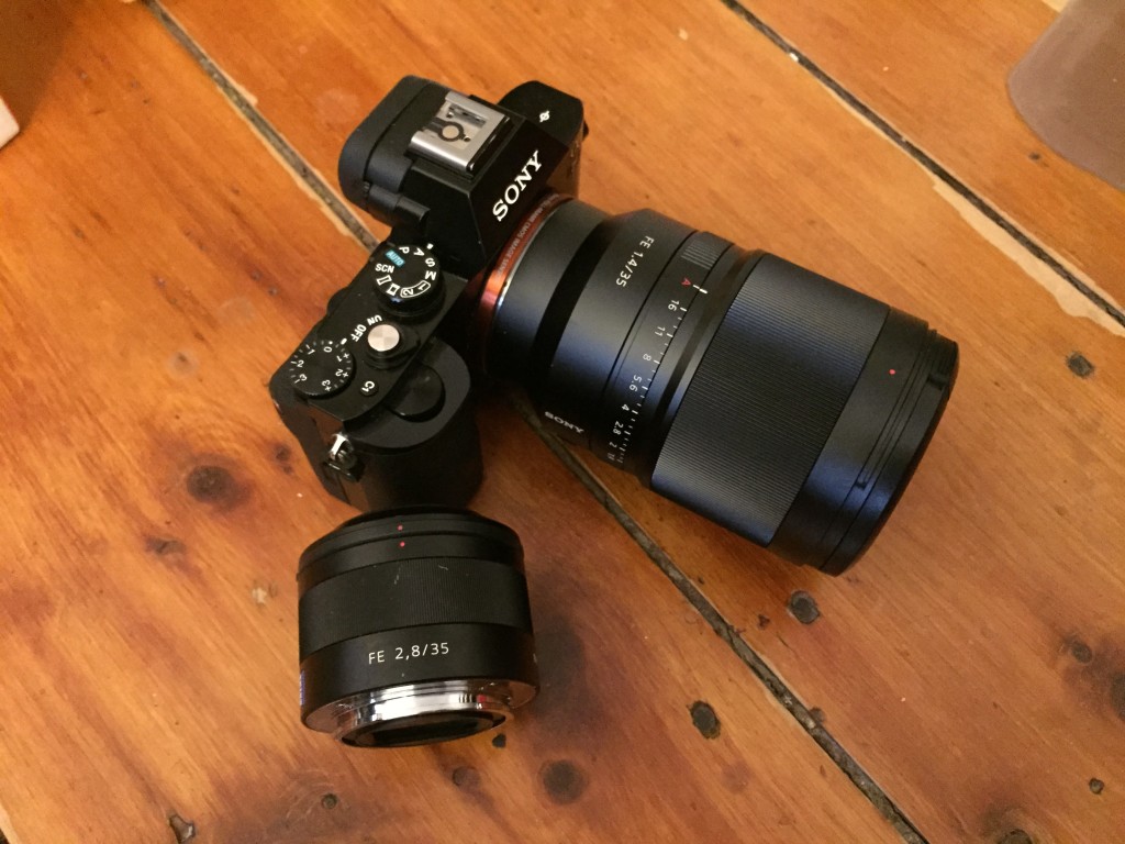 A7R with lens attached, next to the older 35mm f/2.8